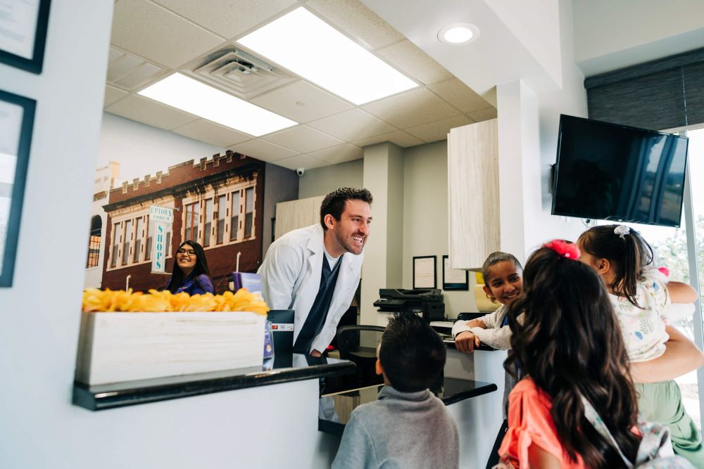 dentist greeting patients