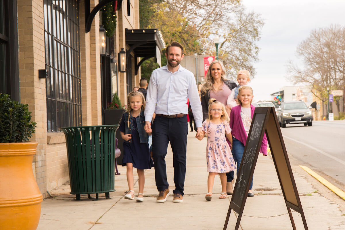 A CDP dentist walks with his family on a trip around town. It's important to take time to yourself and spend time with your loved ones.
