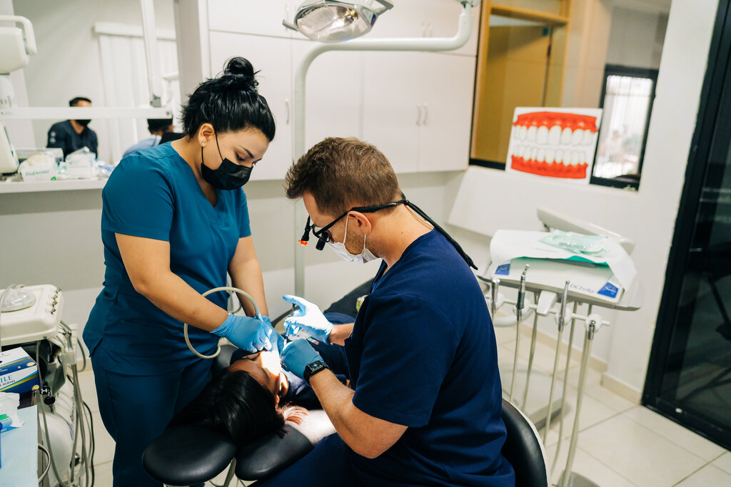 Young patient receiving oral surgery in a practice.